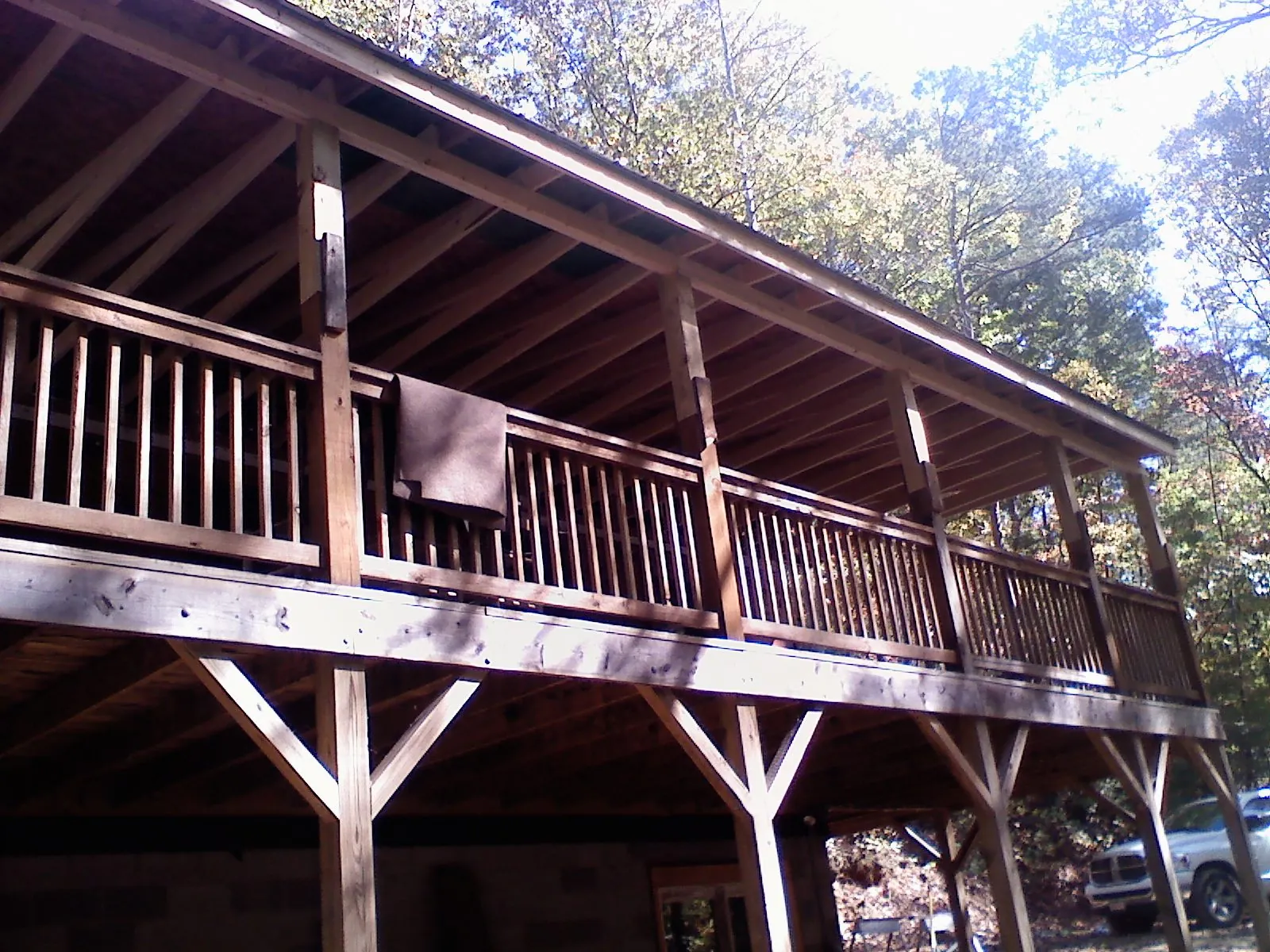 Timber framing under a new elevated porch and deck — Roof Leak Repair in Otego by Roofing Brothers